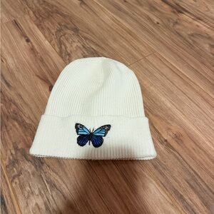 Cream Ribbed Beanie with Blue Butterfly Patch